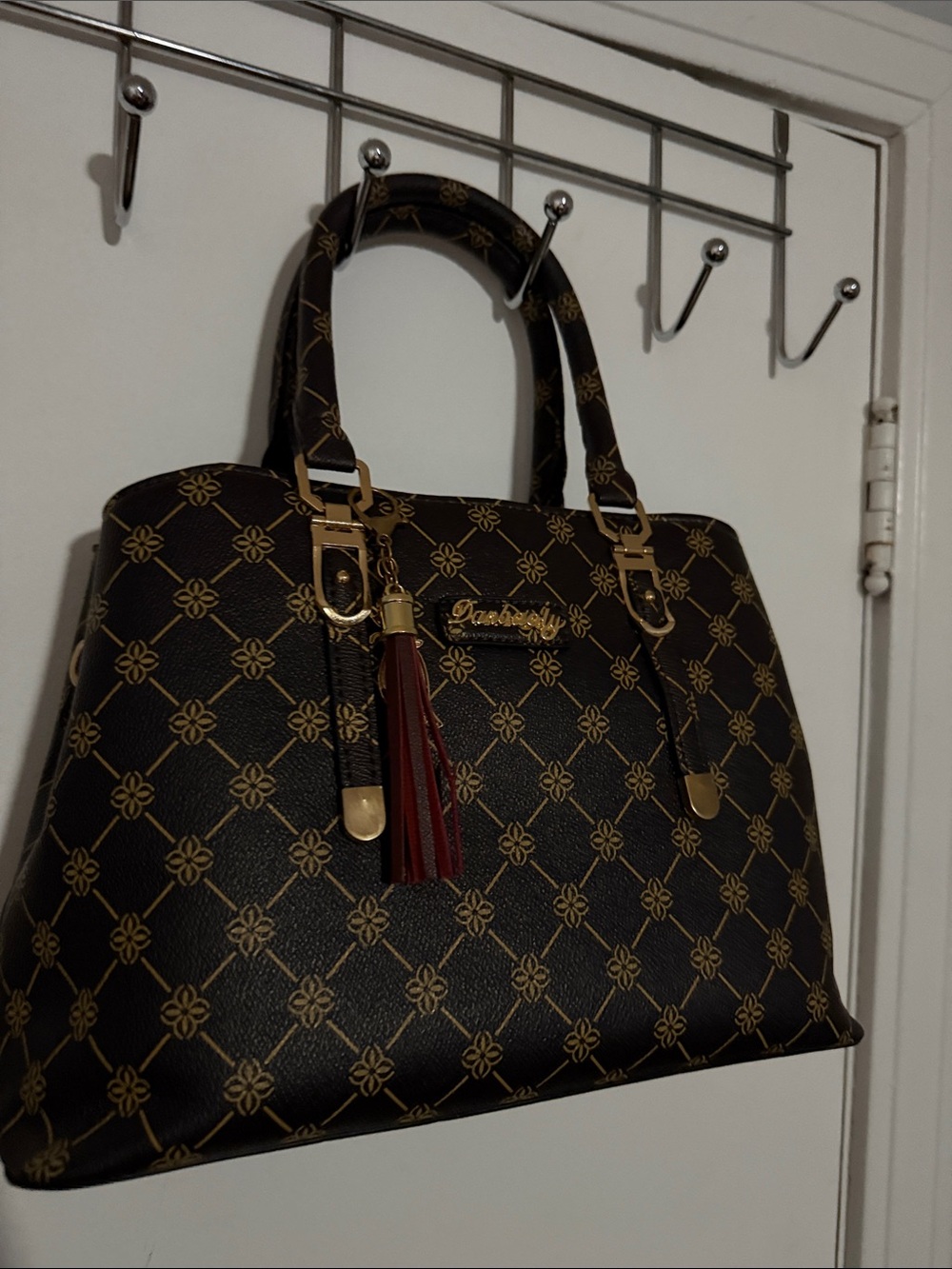 Dark Brown Patterned Satchel with Gold Accents and Tassel